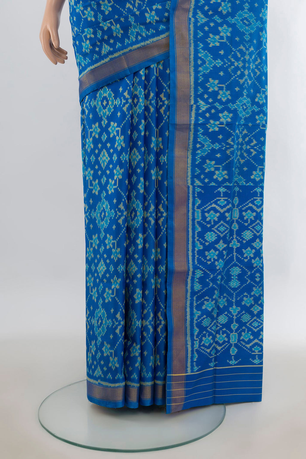Pleats and pallu of Pure Silk Blue Rajkot Patola Saree with Pure Ikat on the body and Zari Border. 