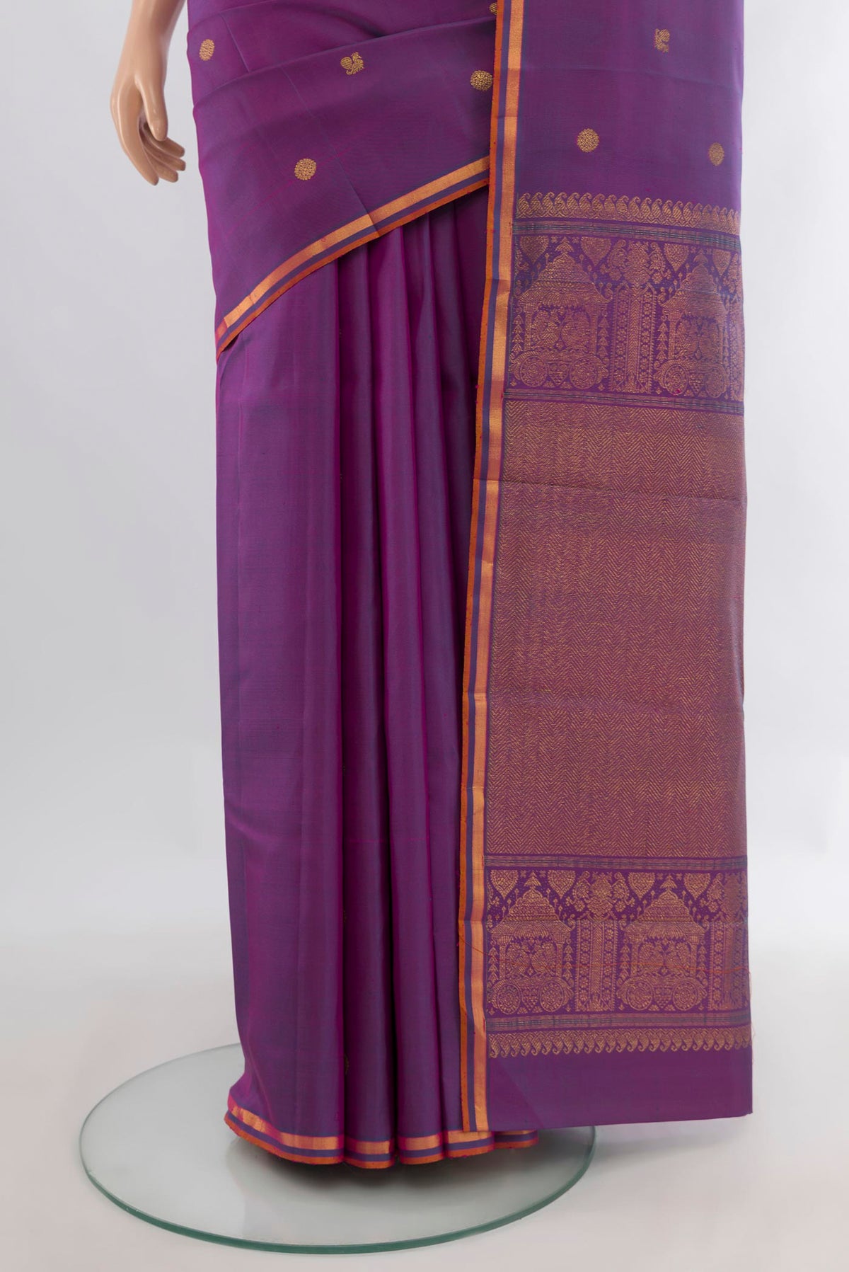 Pleats and pallu of Pure Silk Purple Kanjivaram Saree with Zari Butta on the body and Zari Border. 