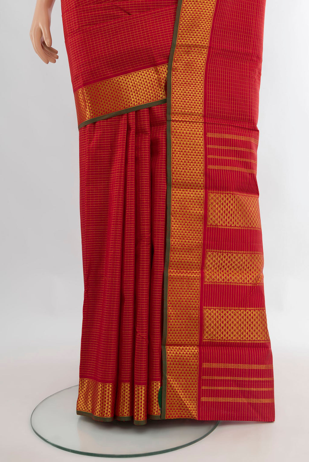 Pleats and pallu of Pure Silk Red Kanchipuram Saree with Checked design on the body and Zari Border. 