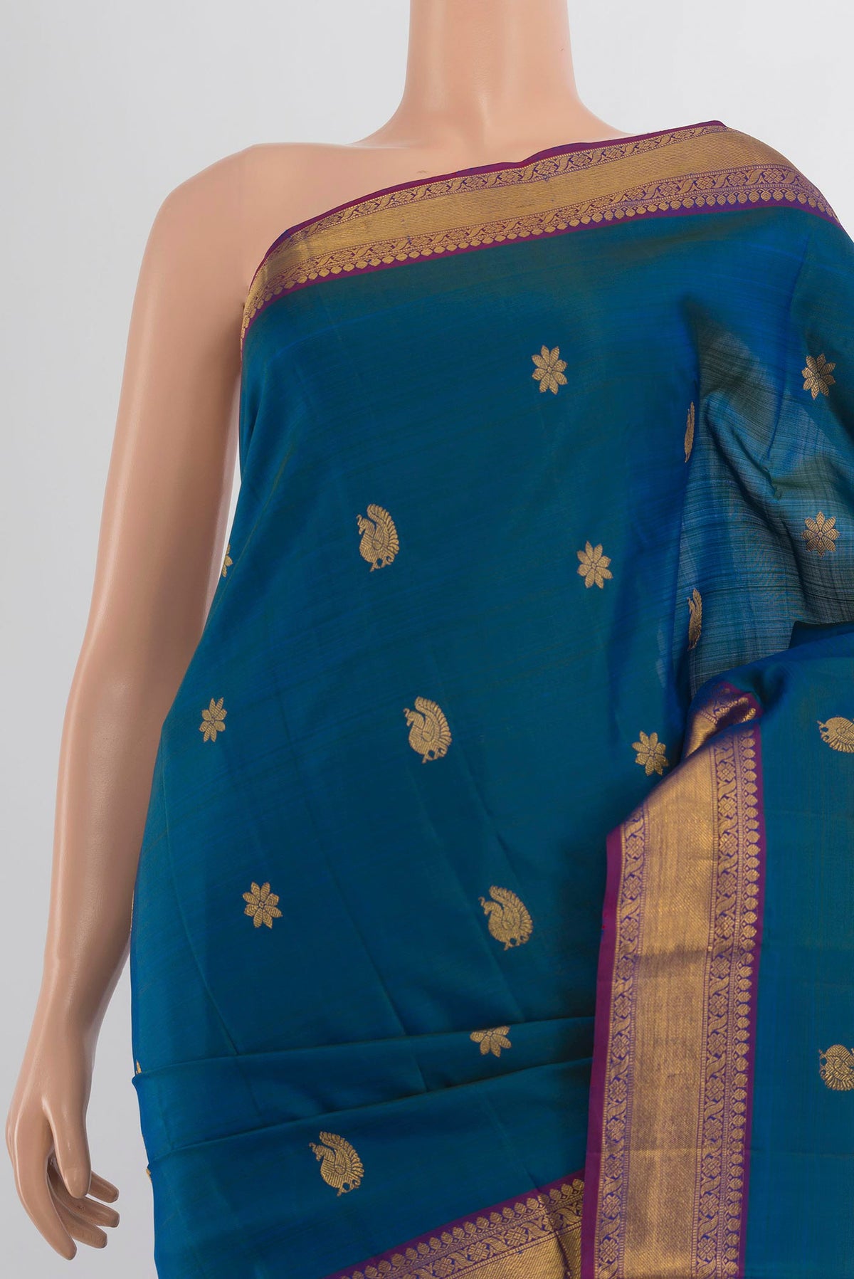 Border image of Pure Silk Pure Zari Peacock Blue Kanjivaram Saree with Zari Butta on the body and Silk Border. 