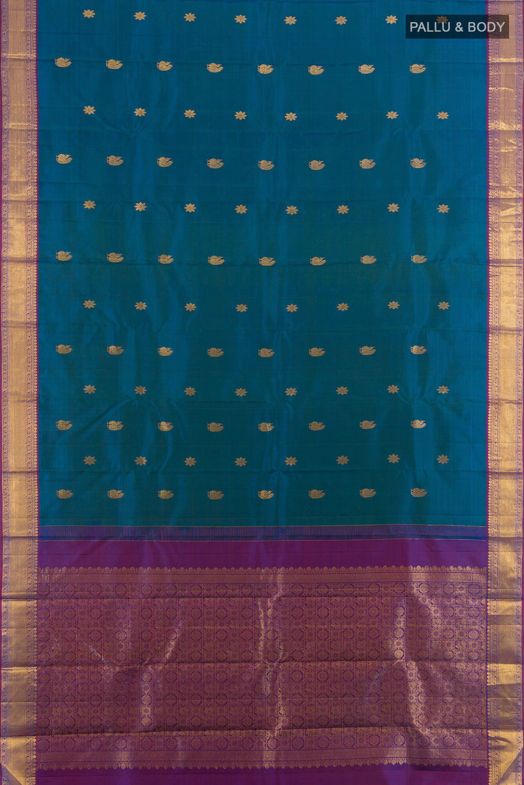 Flat view of Pure Silk Pure Zari Peacock Blue Kanjivaram Saree with Zari Butta on the body and Silk Border. 