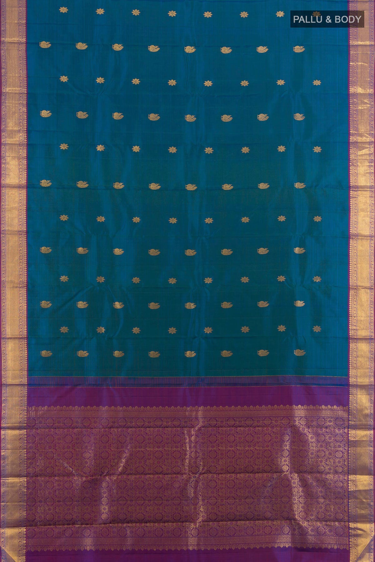 Flat view of Pure Silk Pure Zari Peacock Blue Kanjivaram Saree with Zari Butta on the body and Silk Border. 