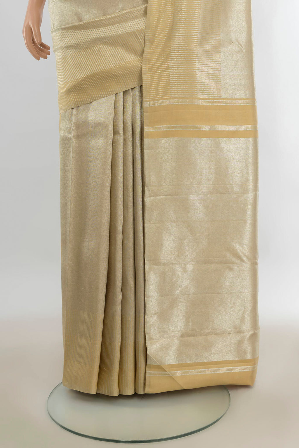 Pleats and pallu of Gold Kanchipuram Tissue Saree with Zari Brocade on the body and Zari Border. 