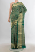 Pure Silk Green Kanjivaram Saree with Zari Brocade on the body and Zari Border.  displayed on a mannequin