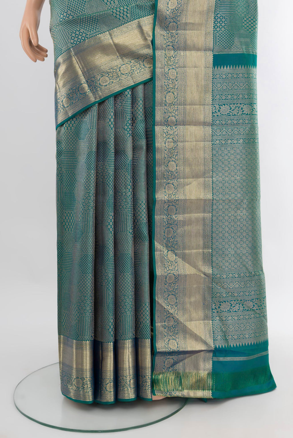 Pleats and pallu of Peacock Blue Kanjivaram Silk Saree with Zari Brocade on the body and Zari Border. 