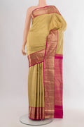 Pure Silk Golden Kanchipuram Saree with Zari Brocade on the body and Zari Border.  displayed on a mannequin
