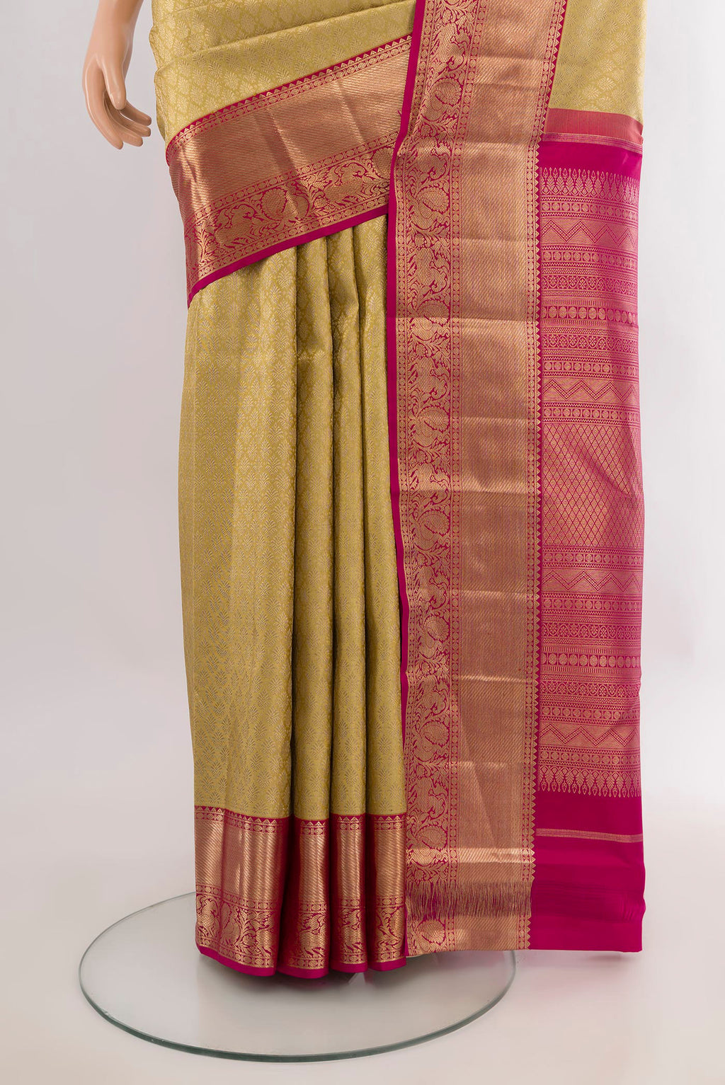 Pleats and pallu of Pure Silk Golden Kanchipuram Saree with Zari Brocade on the body and Zari Border. 
