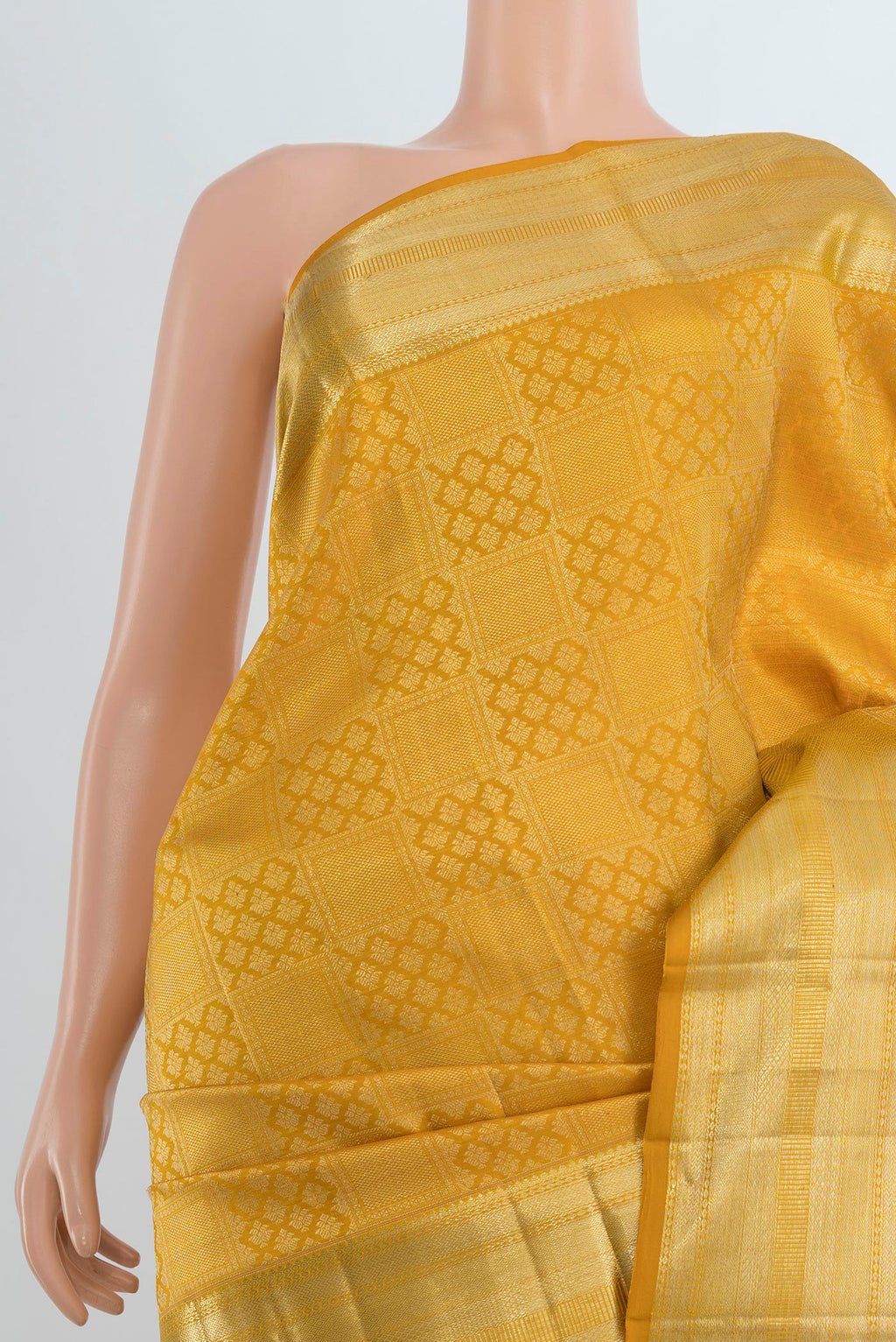 Border image of Pure Silk Mustard Kanchipuram Saree with Zari Butta on the body and Silk Border. 