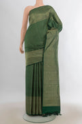 Pure Silk Bottle Green Kanchipuram Saree with Zari Brocade on the body and Zari Border.  displayed on a mannequin