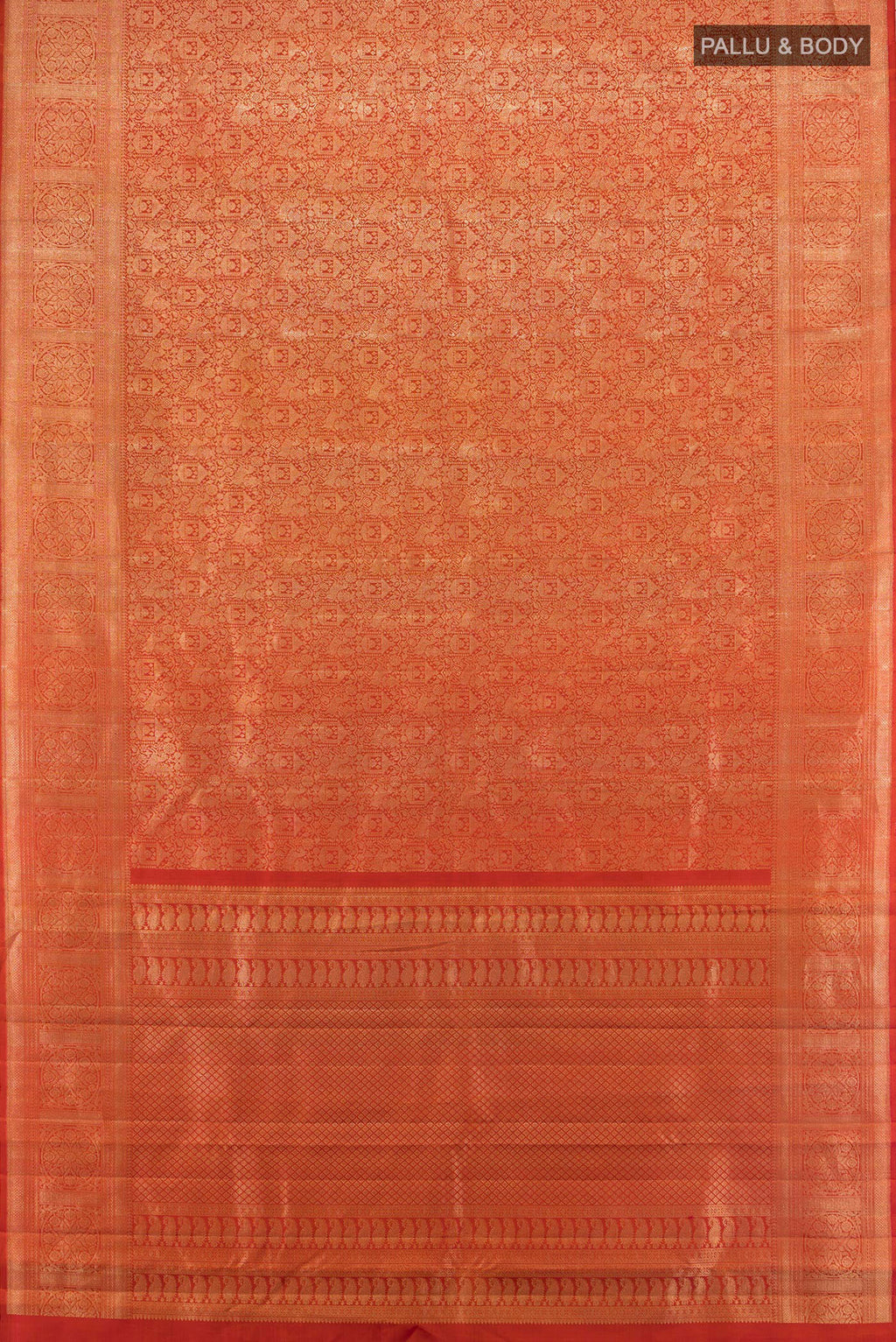 Flat view of Rust Kanchipuram Silk Saree with Zari Brocade on the body and Zari Border. 