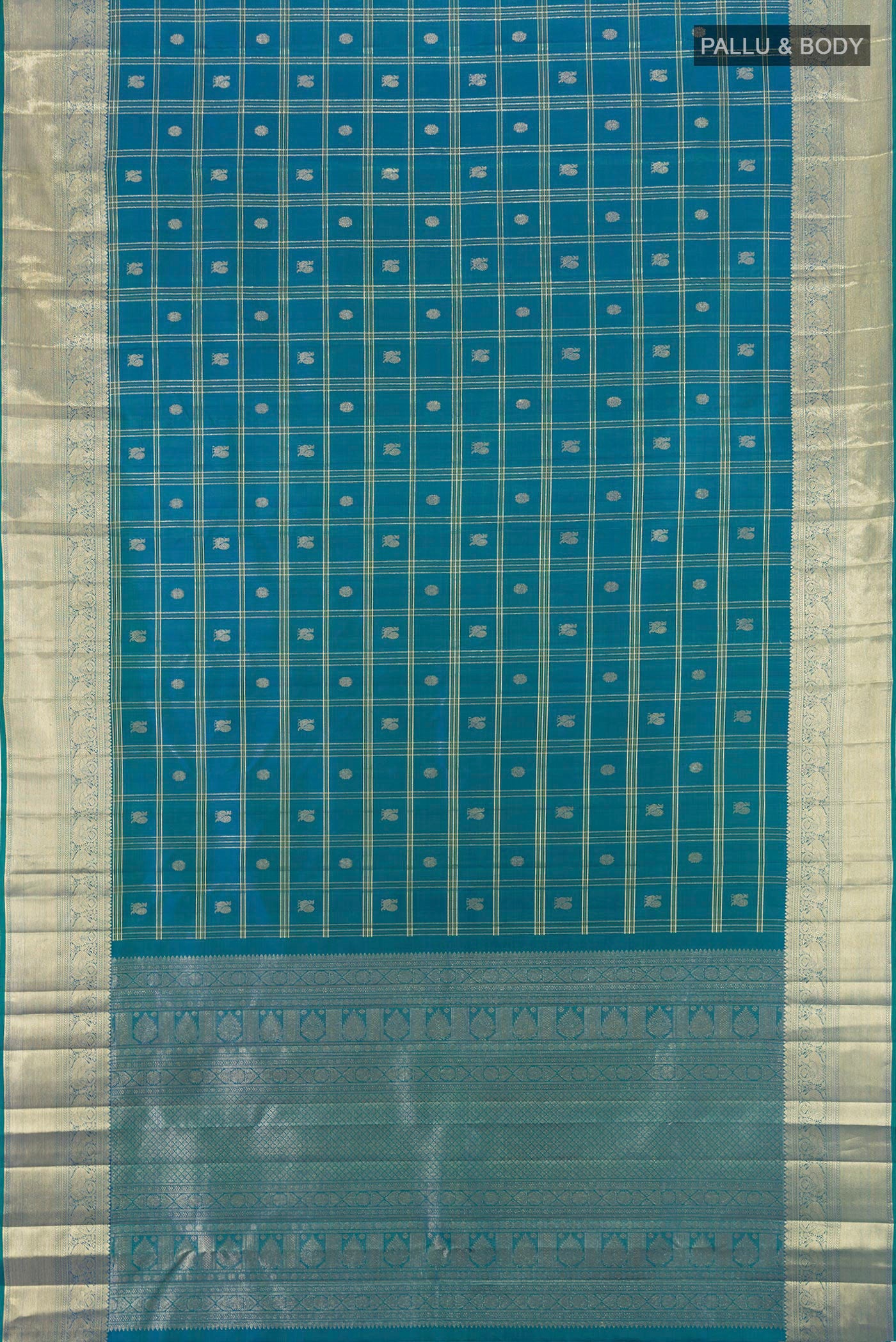 Flat view of Peacock Blue Kanchipuram Silk Saree with Checked design on the body and Zari Border. 