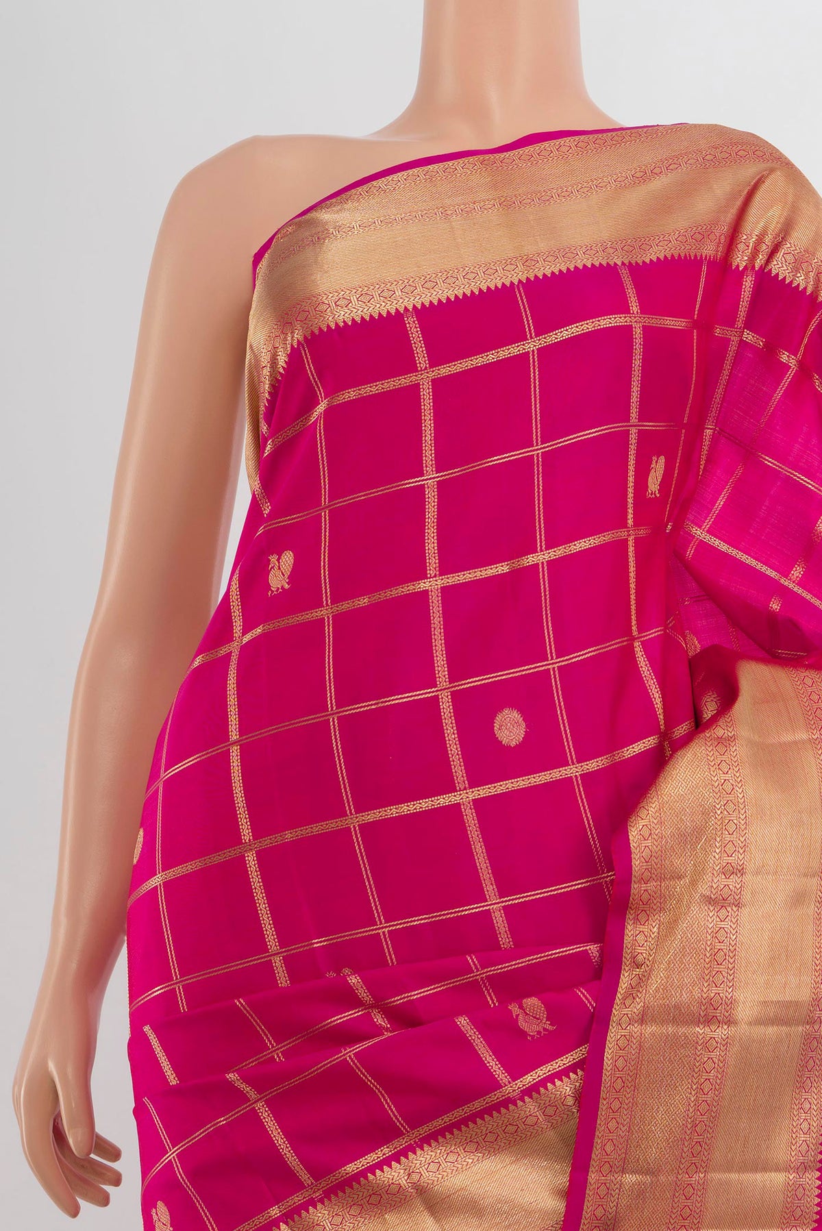 Border image of Pure Silk Rani Pink Kanchipuram Saree with Zari Butta on the body and Silk Border. 