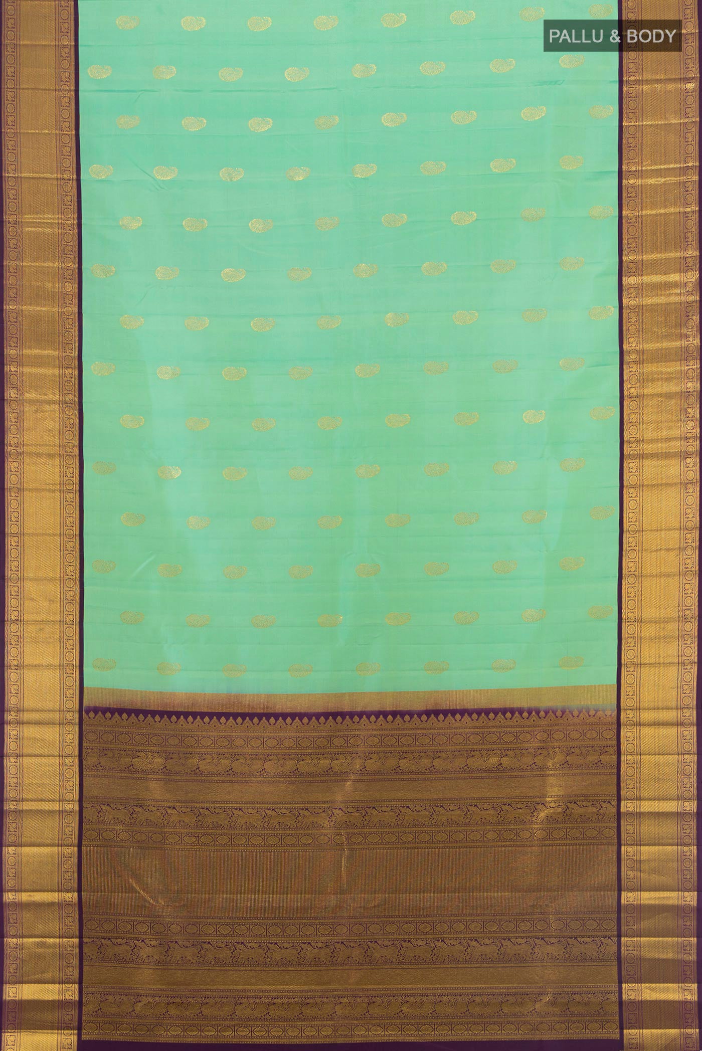 Flat view of Sea Green Kanjivaram Silk Saree with Zari Butta on the body and Zari Border. 