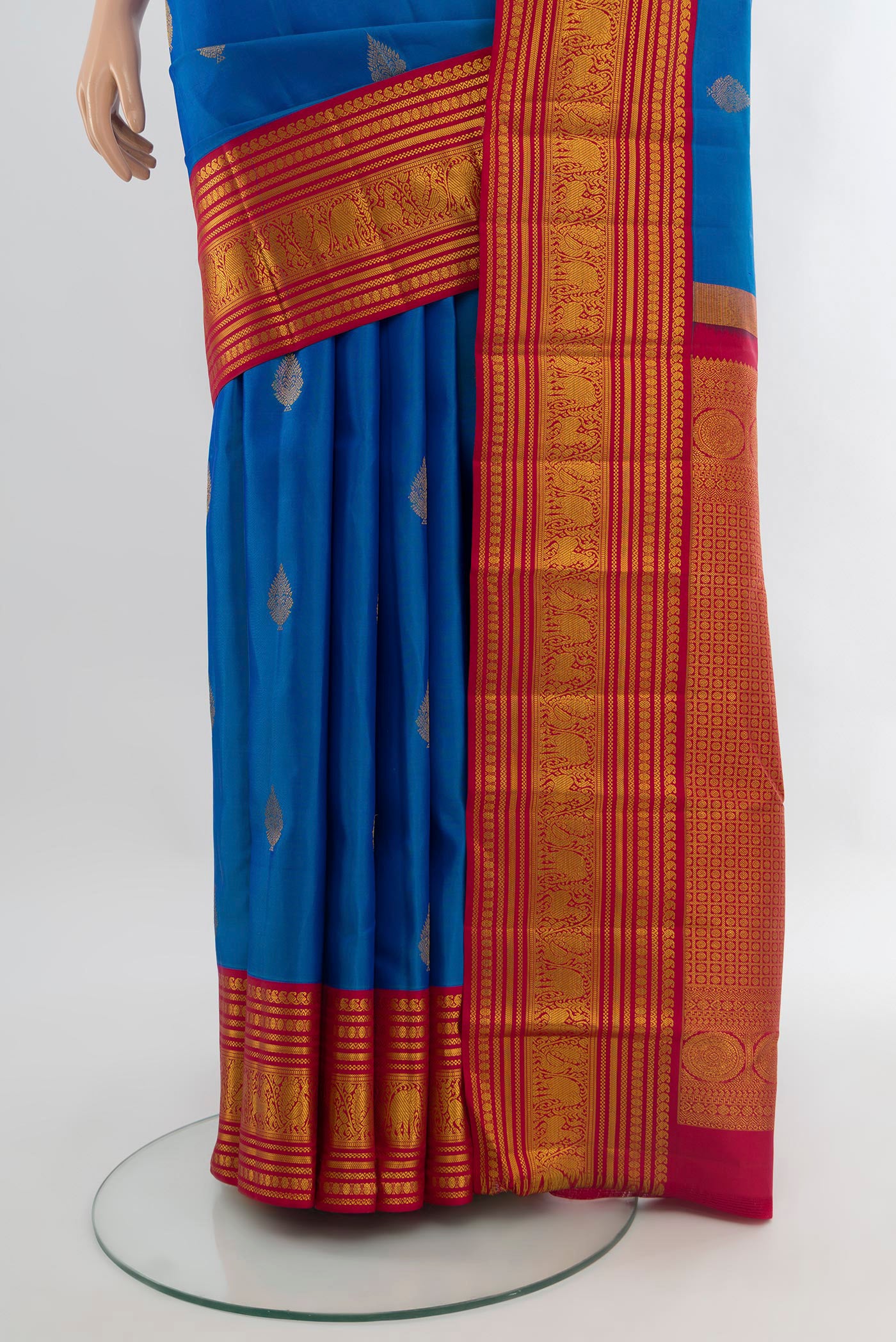 Pleats and pallu of Royal Blue Kanjivaram Silk Saree with Zari Butta on the body and Zari Border. 