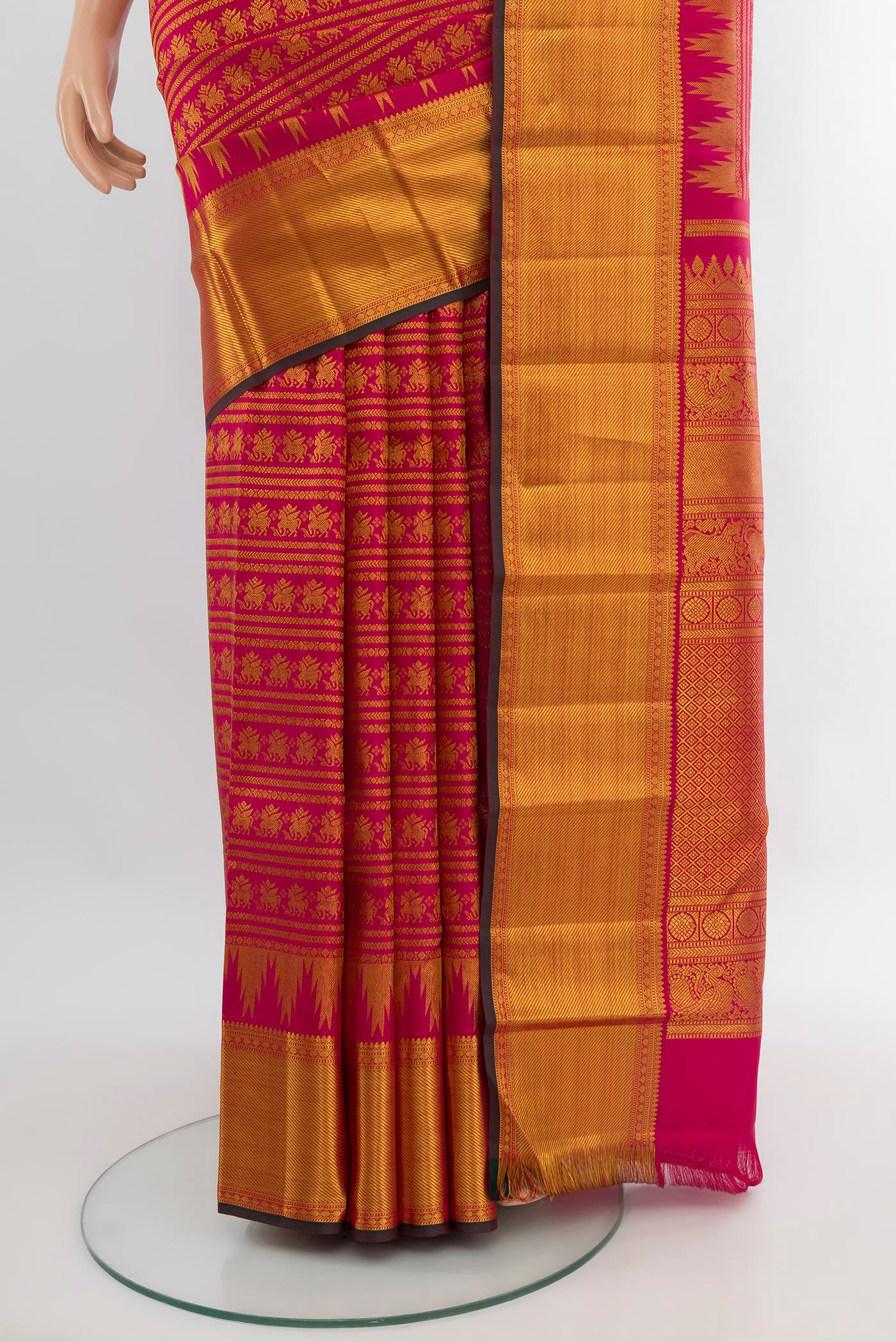 Pleats and pallu of Dark Pink Kanjivaram Silk Saree with Zari Brocade on the body and Zari Border. 