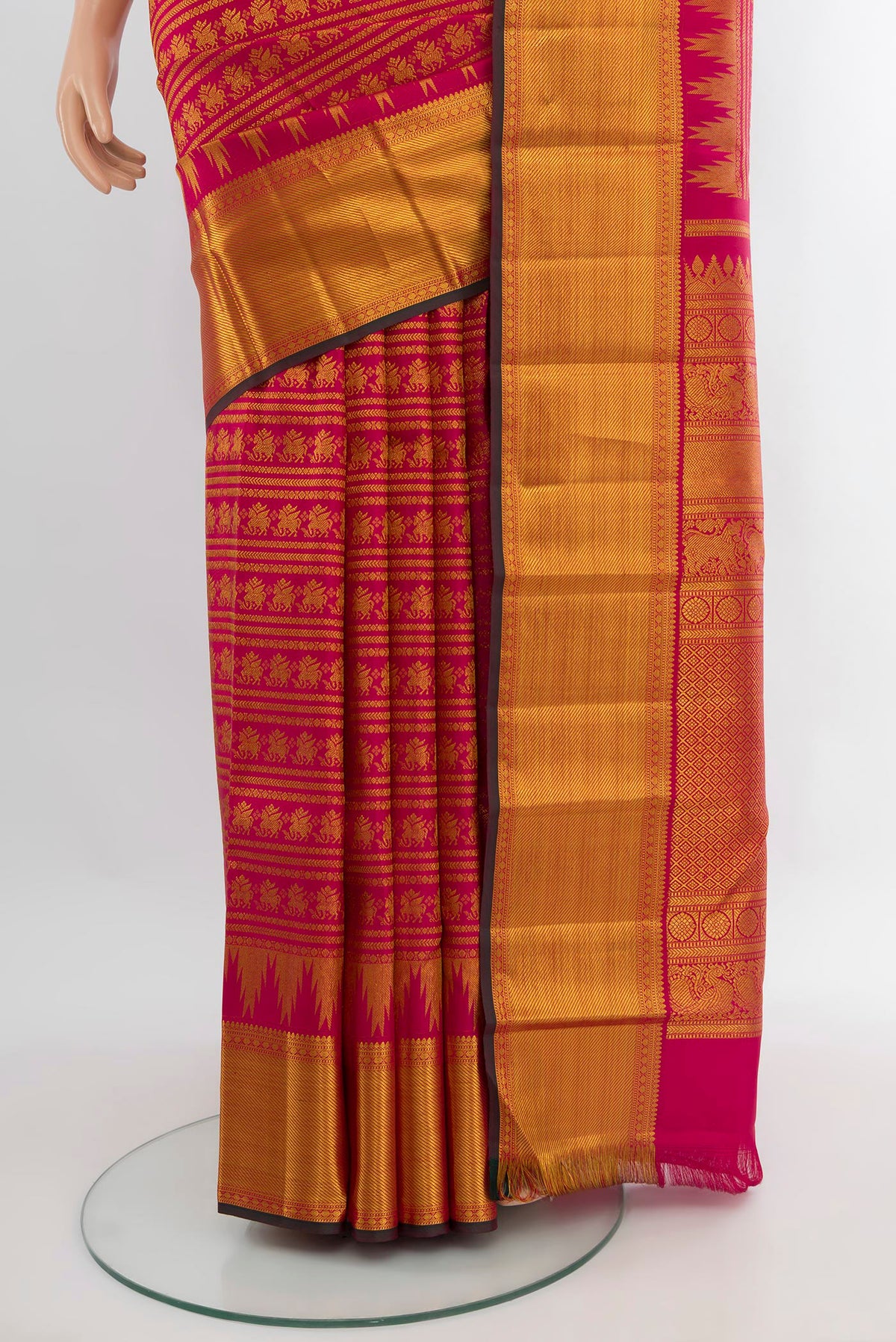 Pleats and pallu of Dark Pink Kanjivaram Silk Saree with Zari Brocade on the body and Zari Border. 