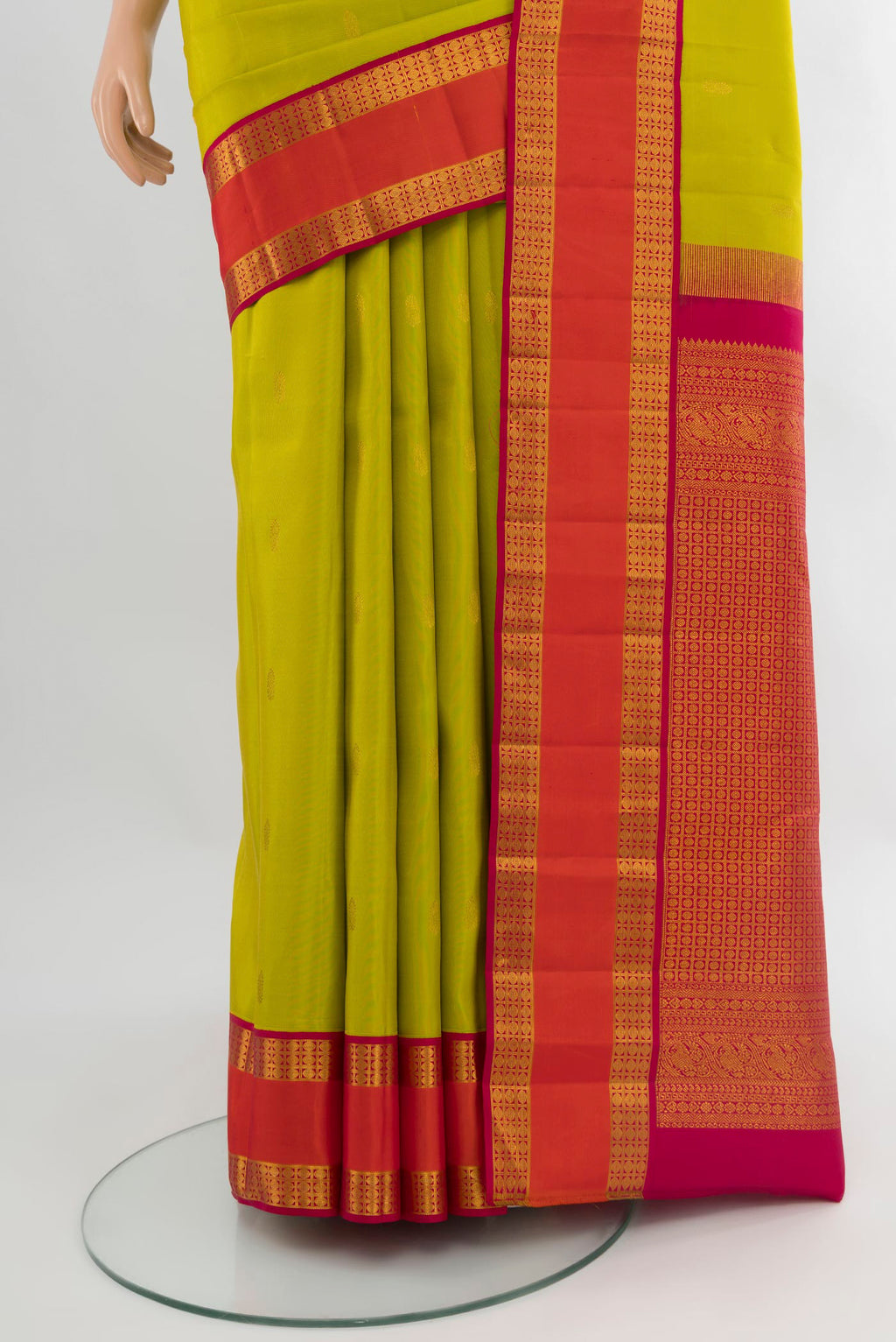 Pleats and pallu of Light Green Kanchipuram Silk Saree with Zari Butta on the body and Zari Border. 