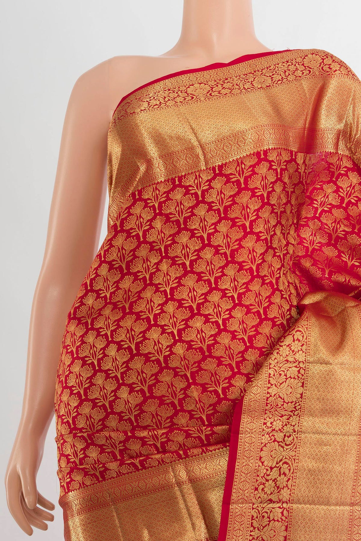 Border image of Pure Silk Red Kanchipuram Saree with Zari Butta on the body and Silk Border. 