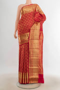 Pure Silk Red Kanchipuram Saree with Zari Butta on the body and Silk Border.  displayed on a mannequin