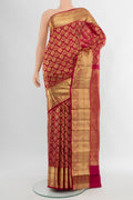 Maroon Kanchipuram Silk Saree with Zari Brocade on the body and Zari Border.  displayed on a mannequin