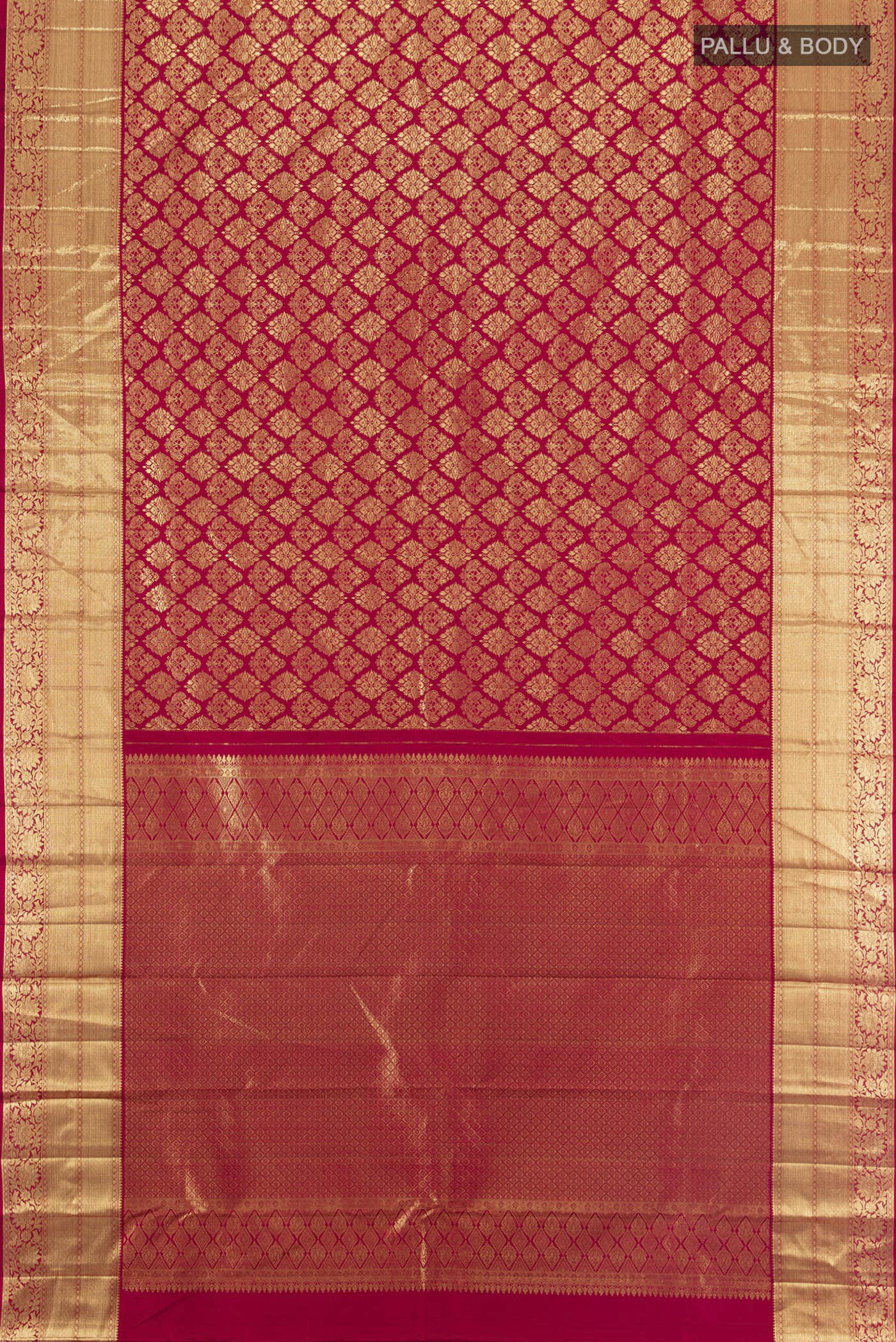 Flat view of Maroon Kanchipuram Silk Saree with Zari Brocade on the body and Zari Border. 