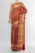 Maroon Kanchipuram Silk Saree with Zari Brocade on the body and Zari Border.  displayed on a mannequin