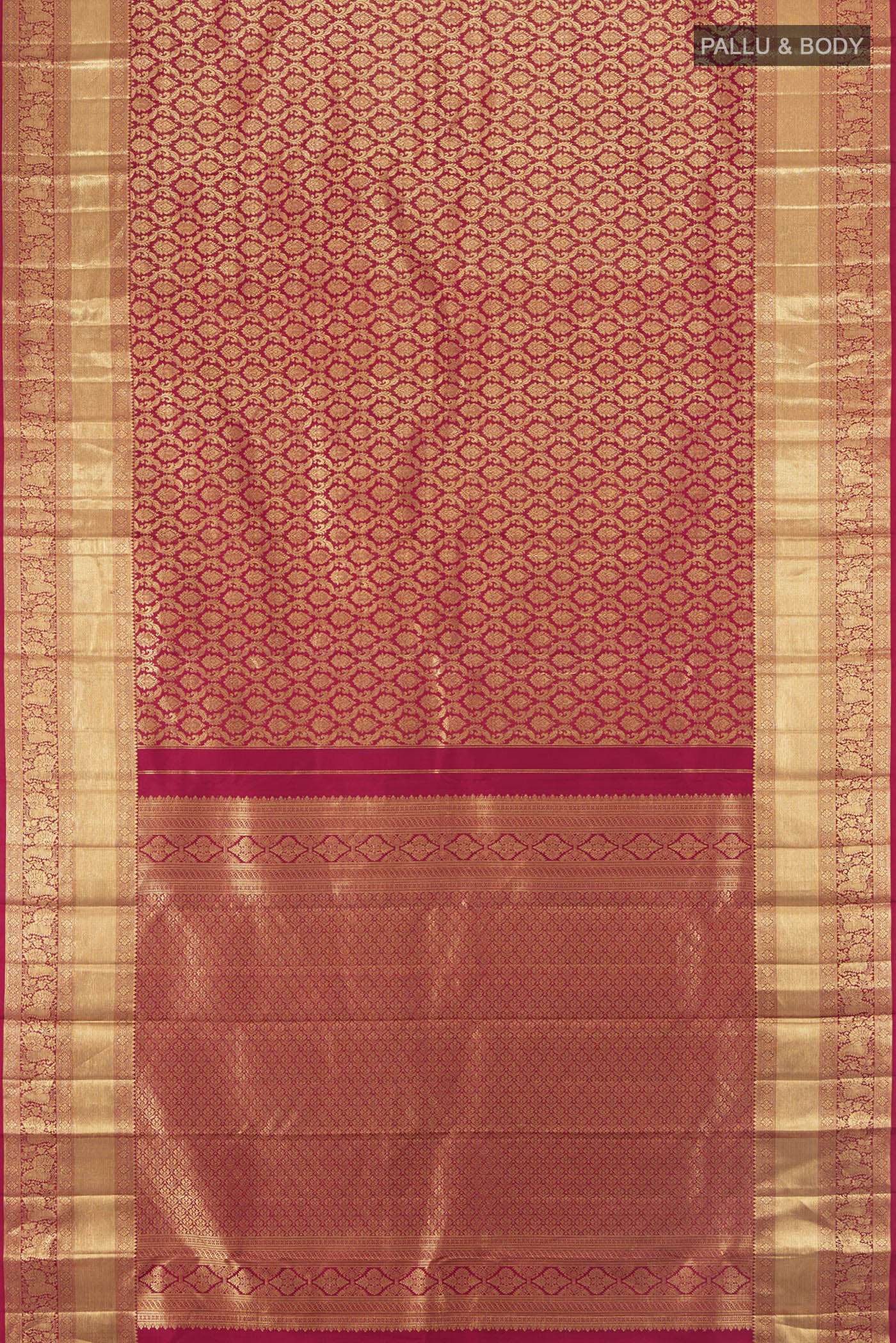 Flat view of Maroon Kanchipuram Silk Saree with Zari Brocade on the body and Zari Border. 