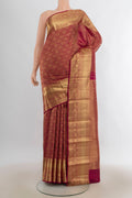 Pure Silk Maroon Kanchipuram Saree with Zari Brocade on the body and Zari Border.  displayed on a mannequin