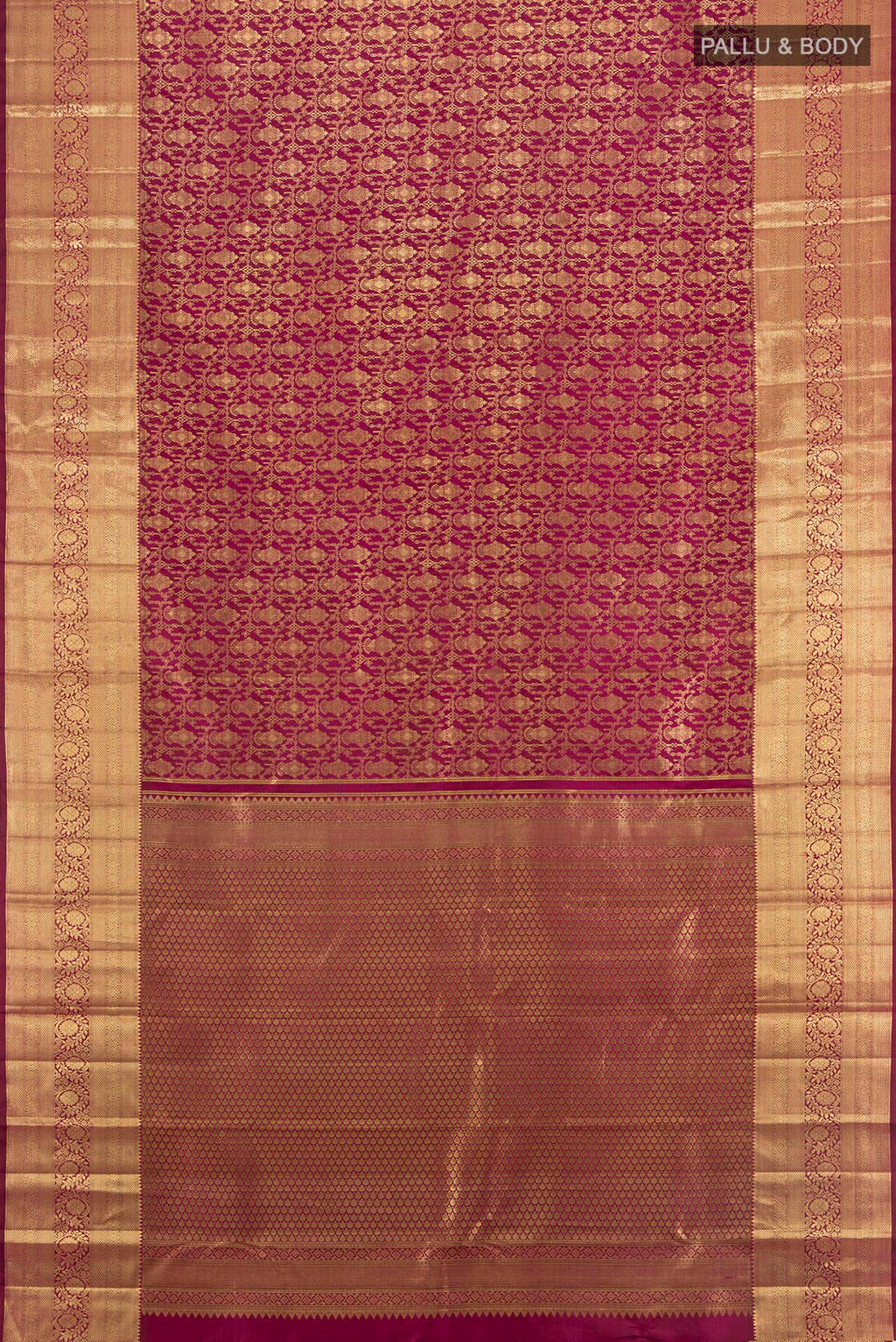 Flat view of Magenta Kanchipuram Silk Saree with Zari Brocade on the body and Zari Border. 