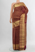 Maroon Kanchipuram Silk Saree with Zari Brocade on the body and Zari Border.  displayed on a mannequin