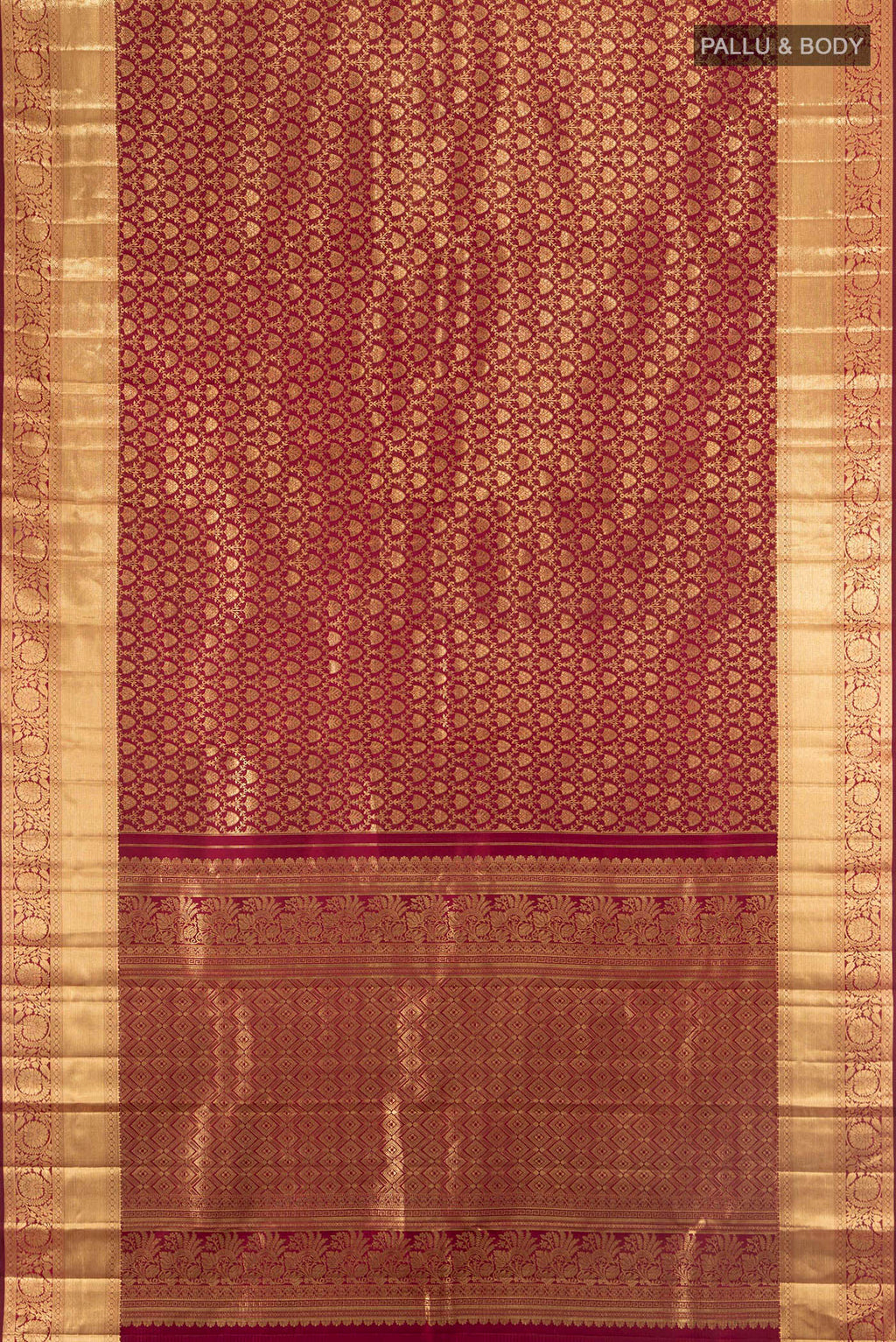 Flat view of Maroon Kanchipuram Silk Saree with Zari Brocade on the body and Zari Border. 