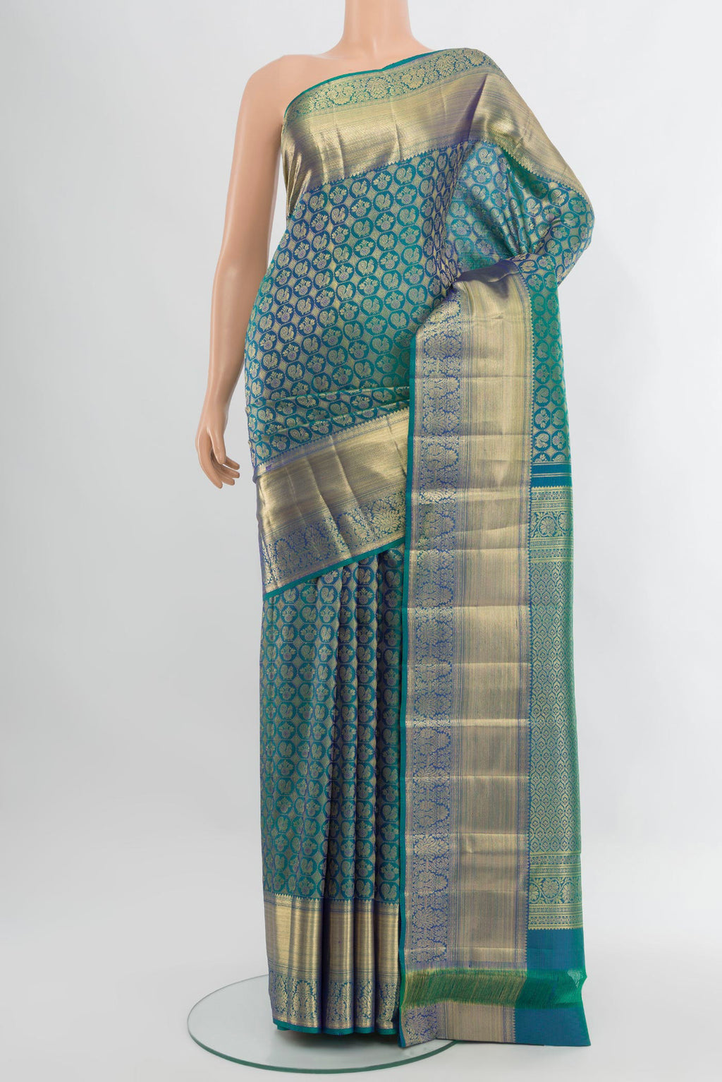 Peacock Blue Dual Tone Kanchipuram Silk Saree with Zari Brocade on the body and Zari Border.  displayed on a mannequin