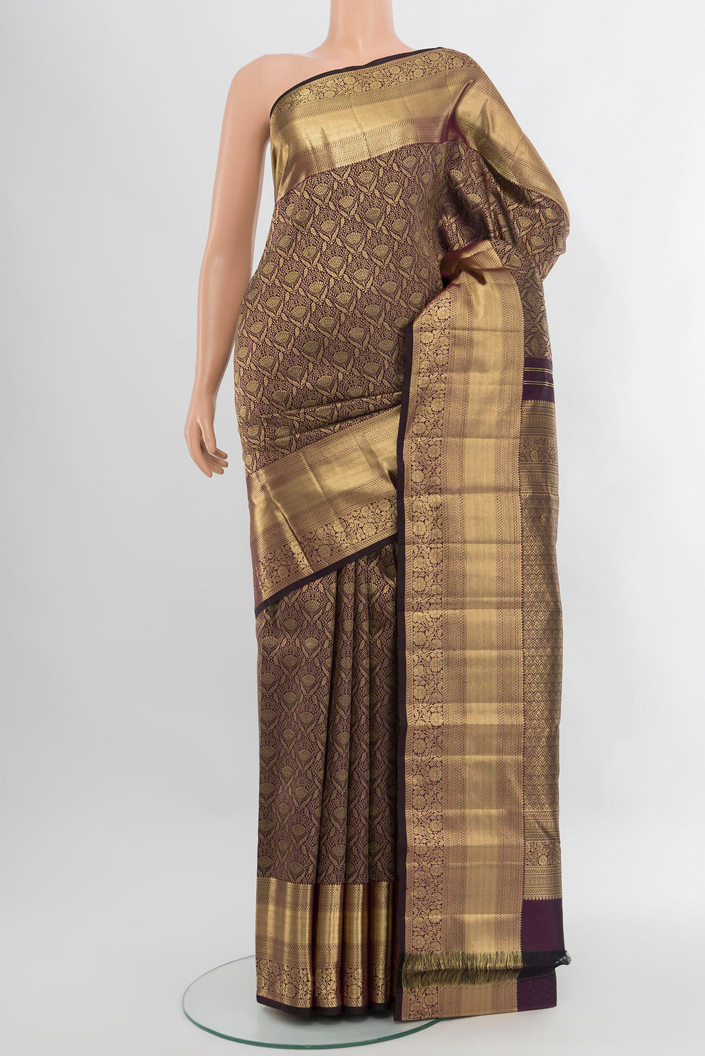 Purple Kanchipuram Silk Saree with Zari Brocade on the body and Zari Border.  displayed on a mannequin