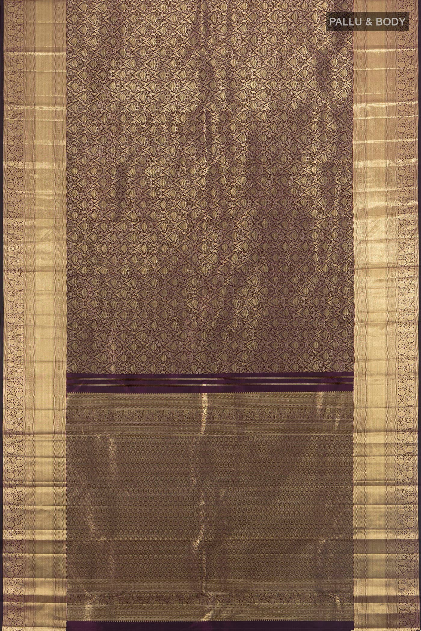 Flat view of Purple Kanchipuram Silk Saree with Zari Brocade on the body and Zari Border. 
