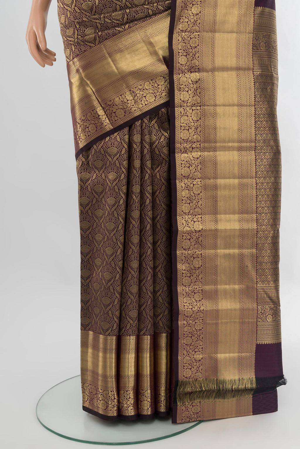 Pleats and pallu of Purple Kanchipuram Silk Saree with Zari Brocade on the body and Zari Border. 