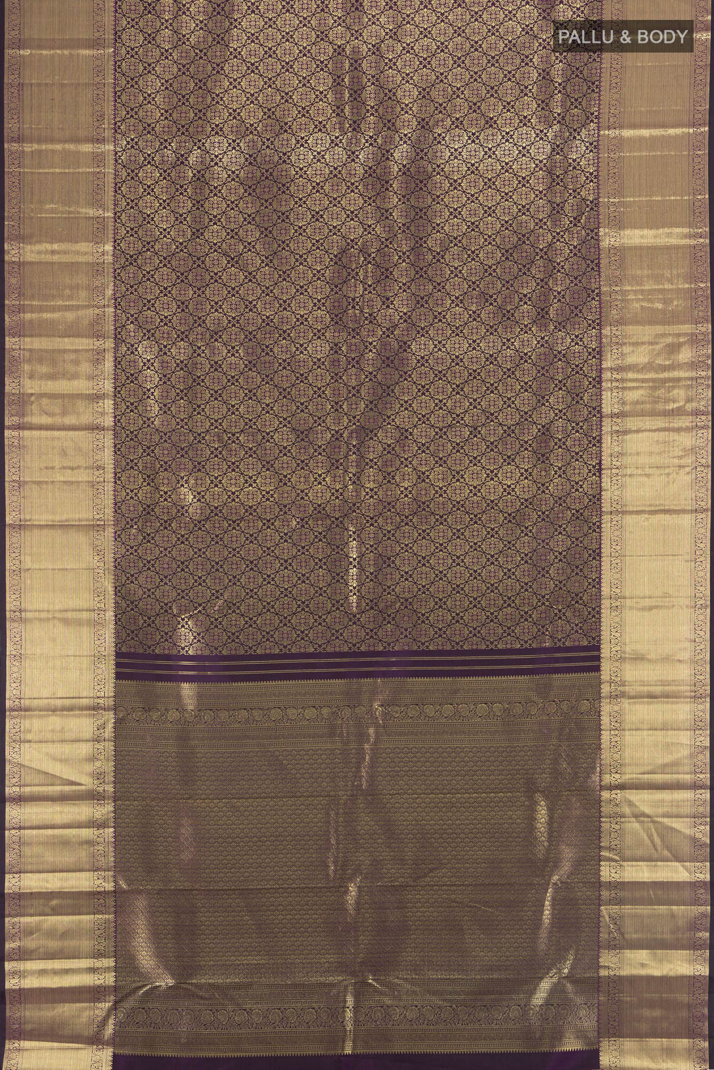 Flat view of Violet Kanchipuram Silk Saree with Zari Brocade on the body and Zari Border. 