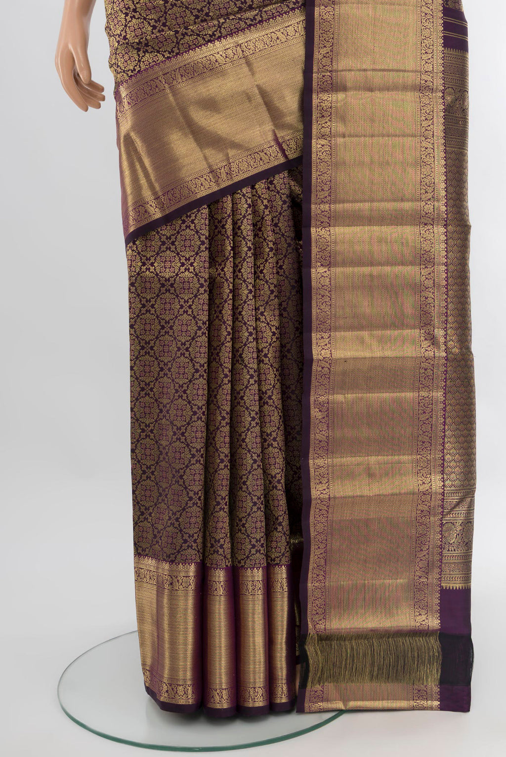 Pleats and pallu of Violet Kanchipuram Silk Saree with Zari Brocade on the body and Zari Border. 