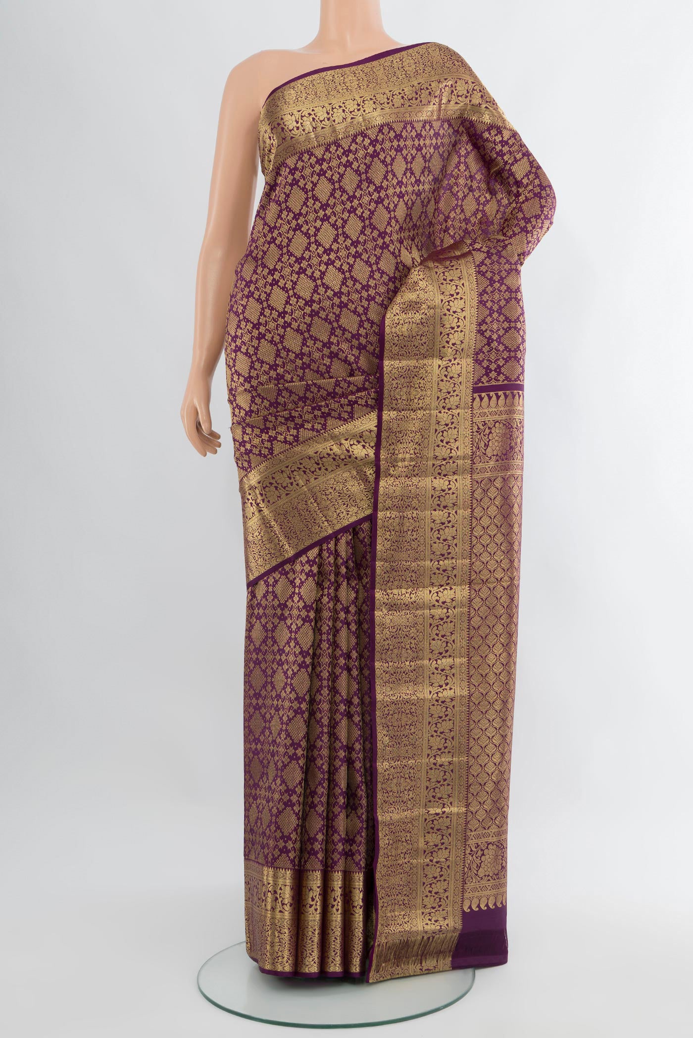 Violet Kanchipuram Silk Saree with Zari Brocade on the body and Zari Border.  displayed on a mannequin