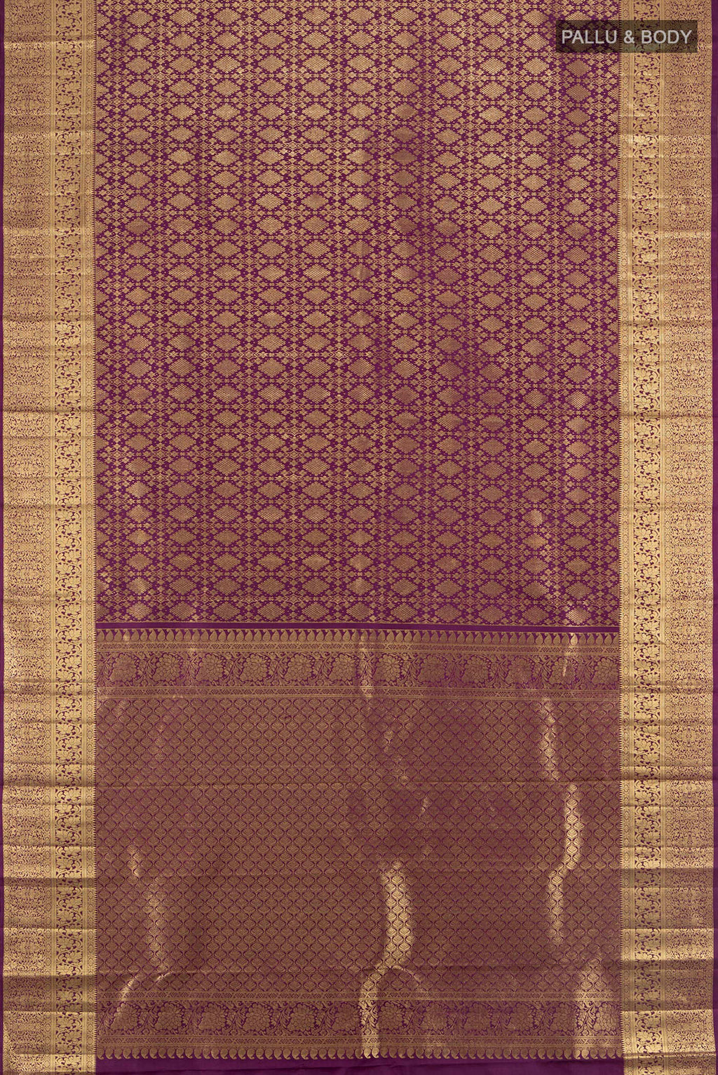 Flat view of Violet Kanchipuram Silk Saree with Zari Brocade on the body and Zari Border. 