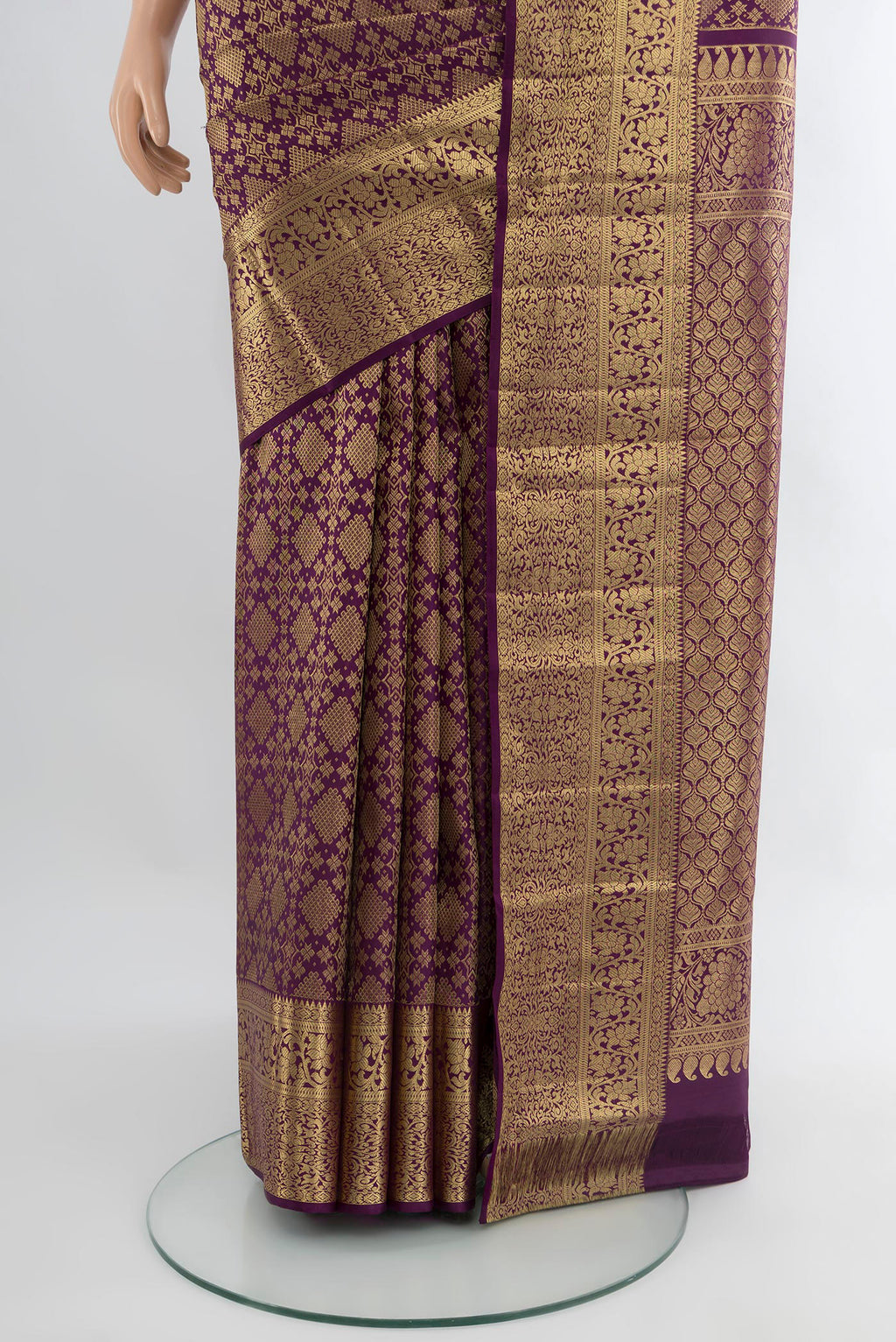 Pleats and pallu of Violet Kanchipuram Silk Saree with Zari Brocade on the body and Zari Border. 