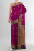 Pure Silk Magenta Kanjivaram Saree with Checked design on the body and Zari Border.  displayed on a mannequin