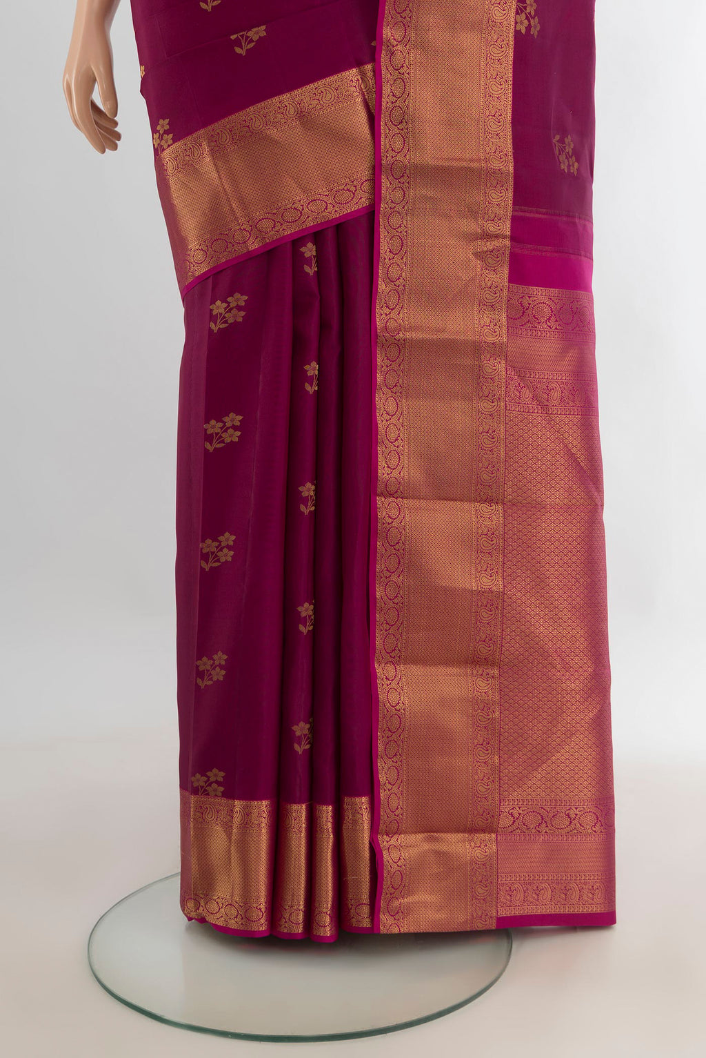 Pleats and pallu of Pure Silk Maroon Kanjivaram Saree with Zari Butta on the body and Zari Border. 