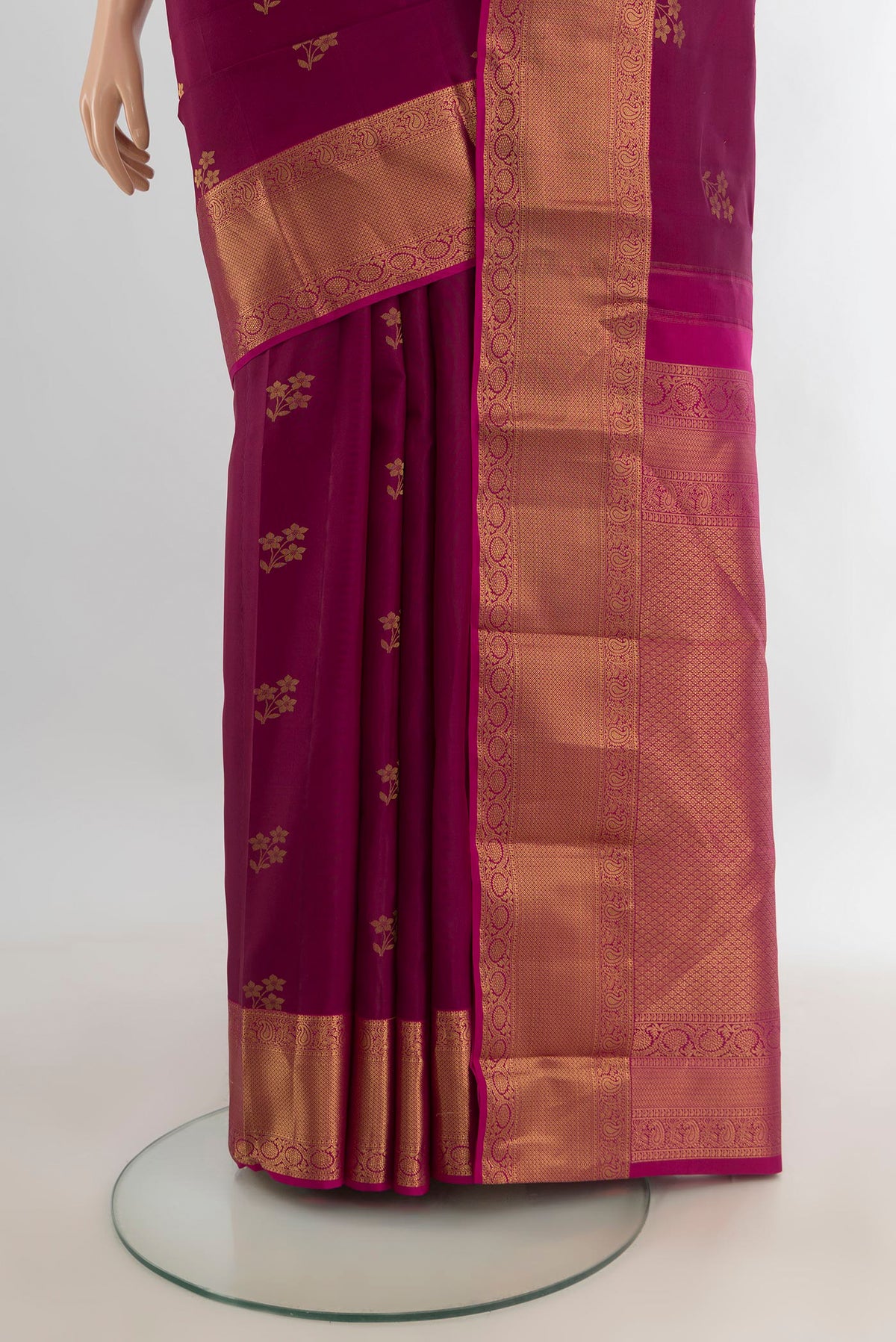Pleats and pallu of Pure Silk Maroon Kanjivaram Saree with Zari Butta on the body and Zari Border. 