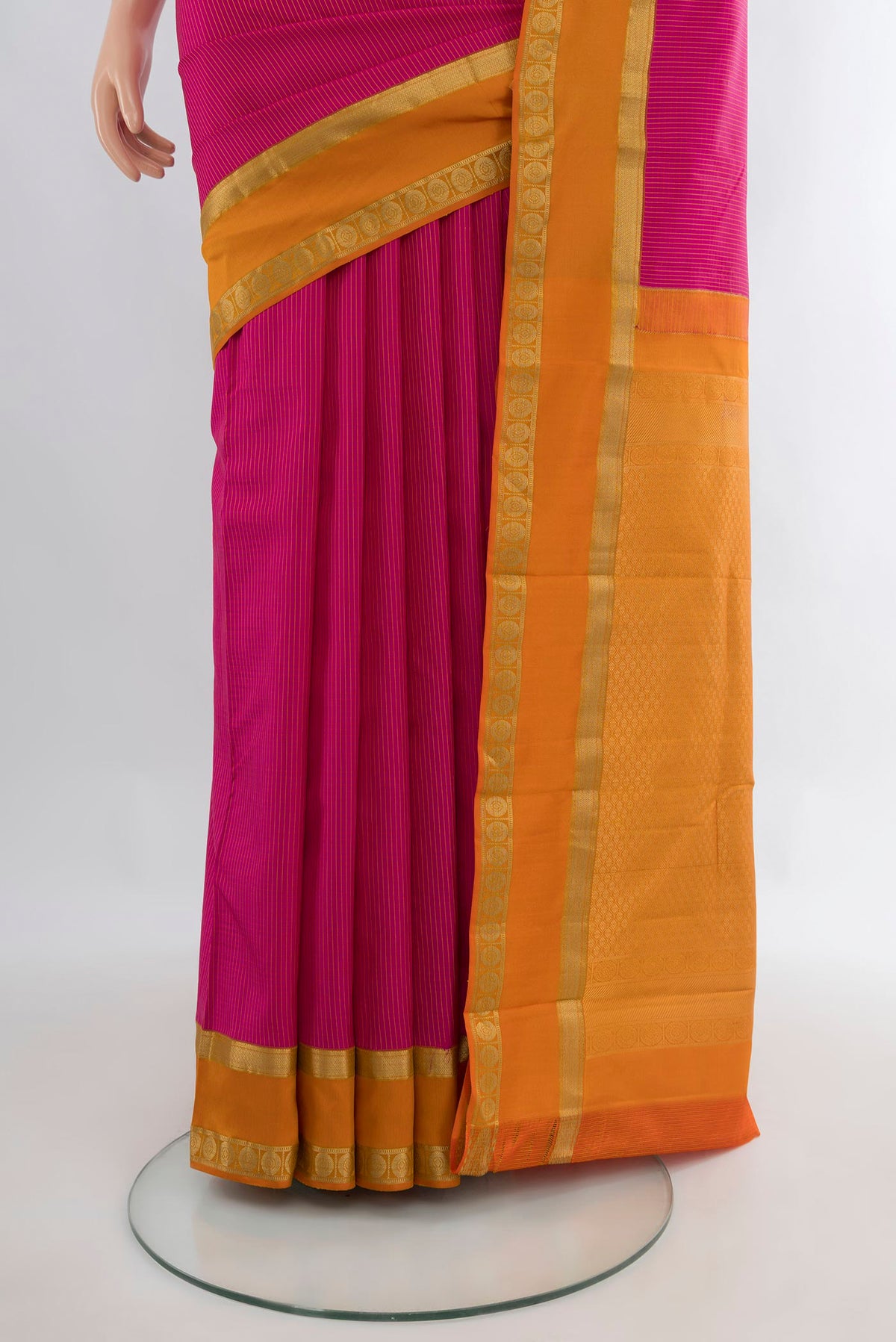Pleats and pallu of Pure Silk Pink Kanjivaram Saree with Stripes on the body and Zari Border. 