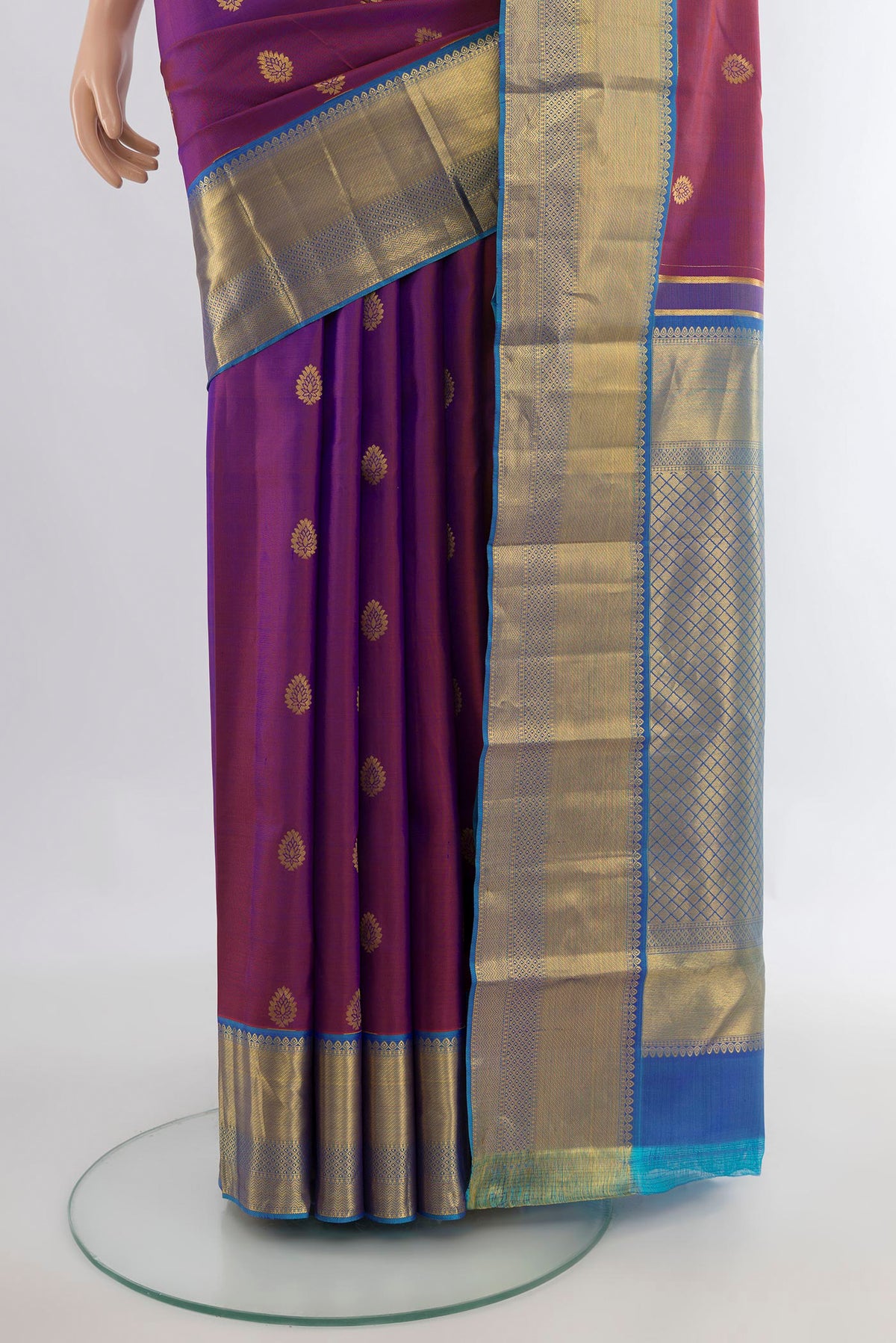 Pleats and pallu of Pure Silk Purple Kanjivaram Saree with Zari Butta on the body and Zari Border. 