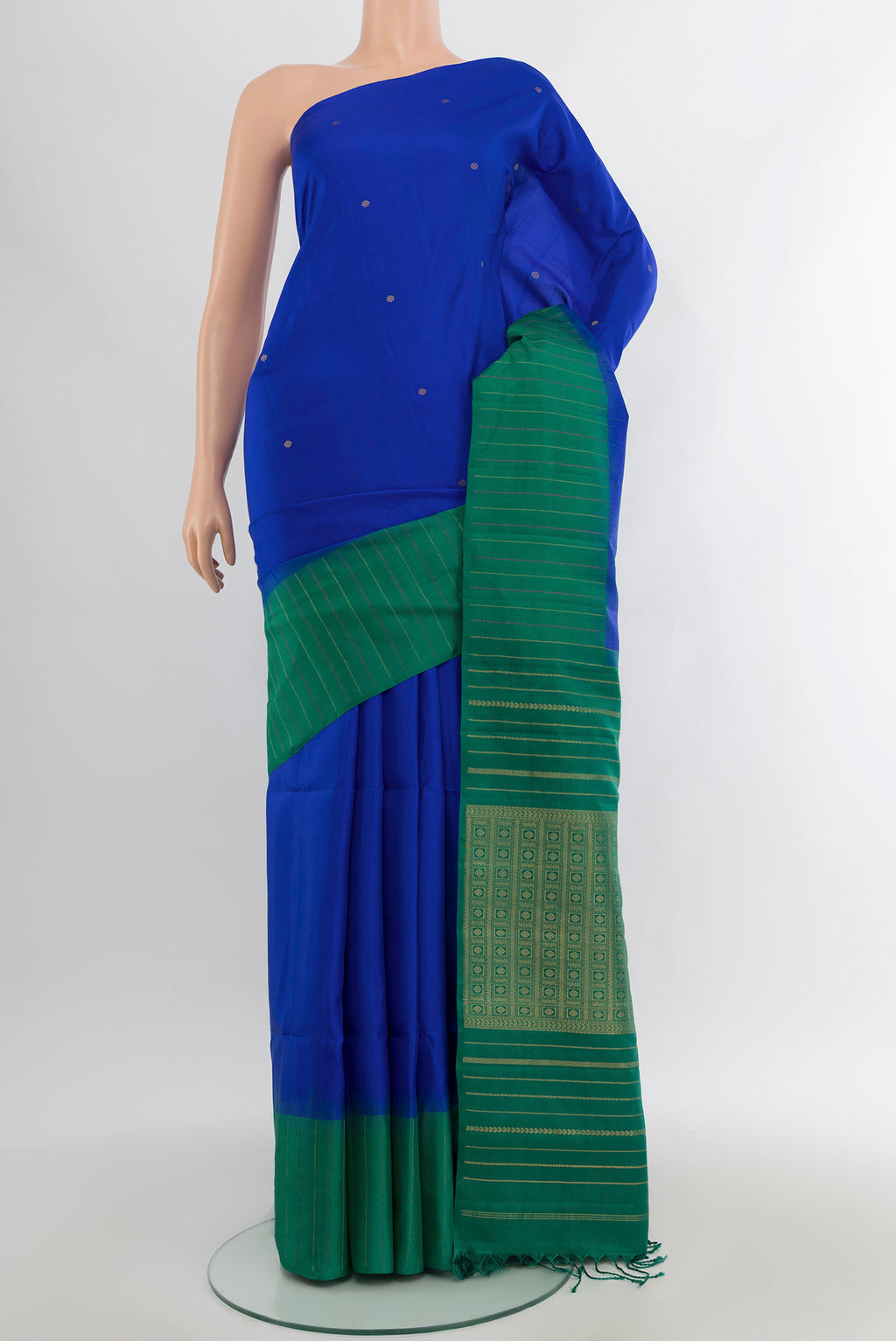 Royal Blue Soft Silk Saree with Zari Butta on the body and Checks Border.  displayed on a mannequin