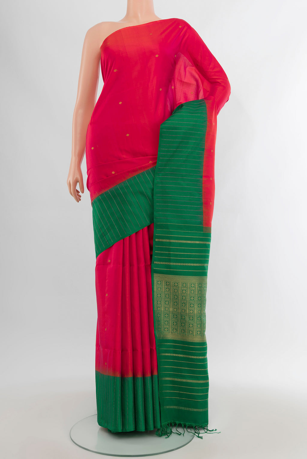 Pink Soft Silk Saree with Zari Butta on the body and Checks Border.  displayed on a mannequin