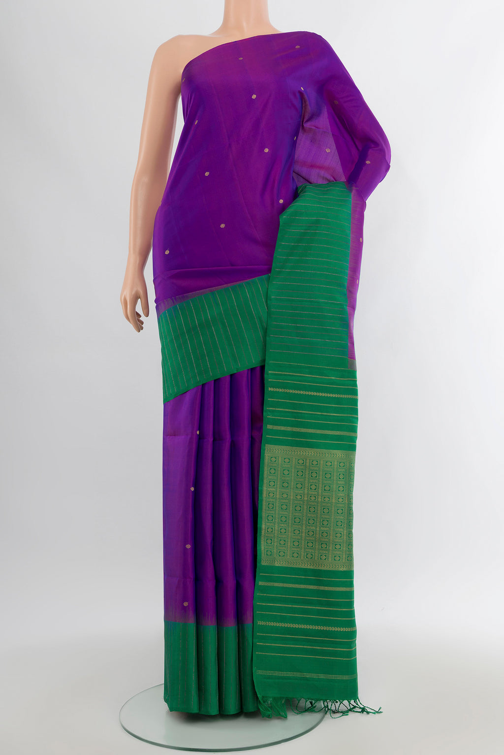 Purple Soft Silk Saree with Zari Butta on the body and One Side Border.  displayed on a mannequin