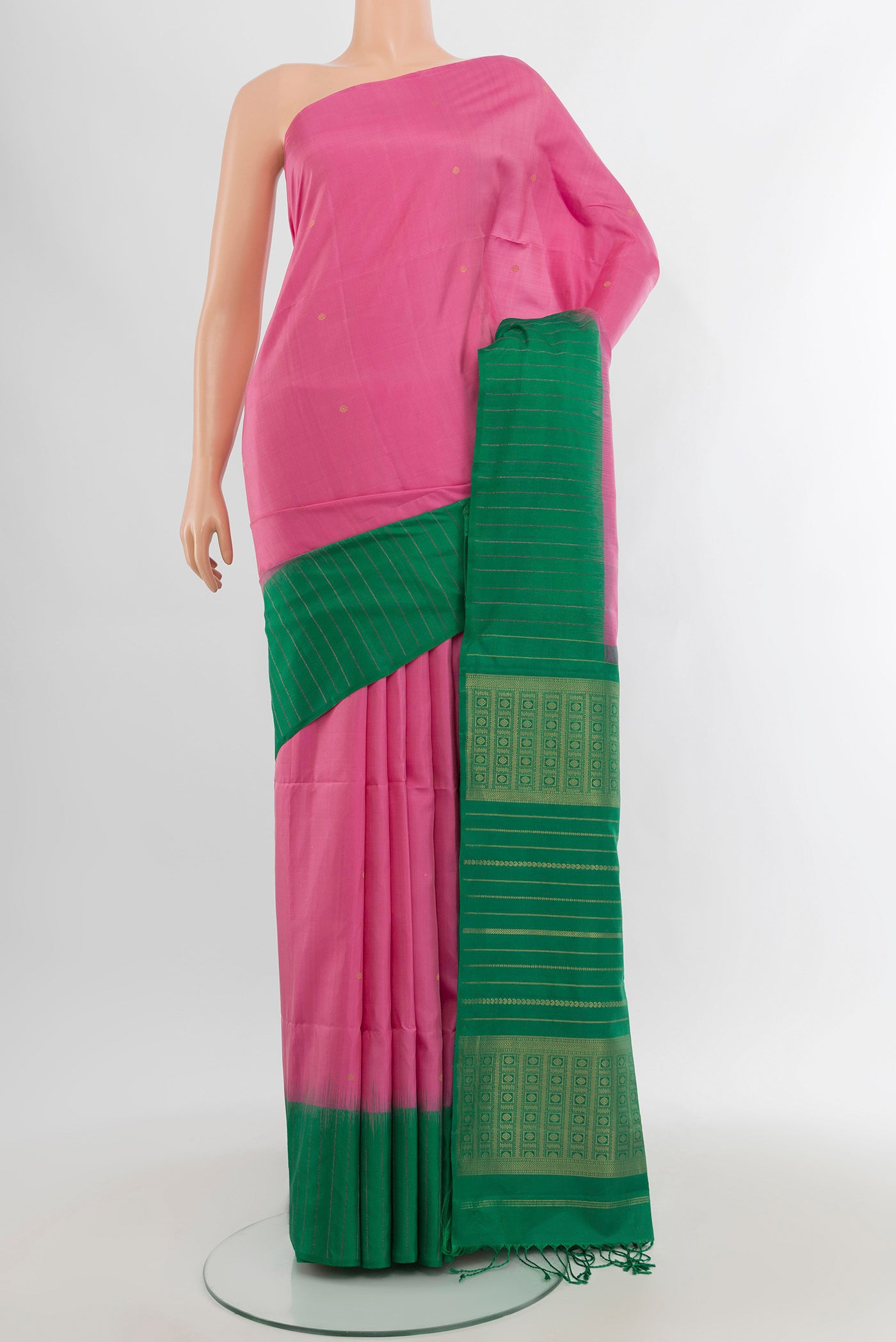 Rose pink Soft Silk Saree with Zari Butta on the body and One Side Border.  displayed on a mannequin