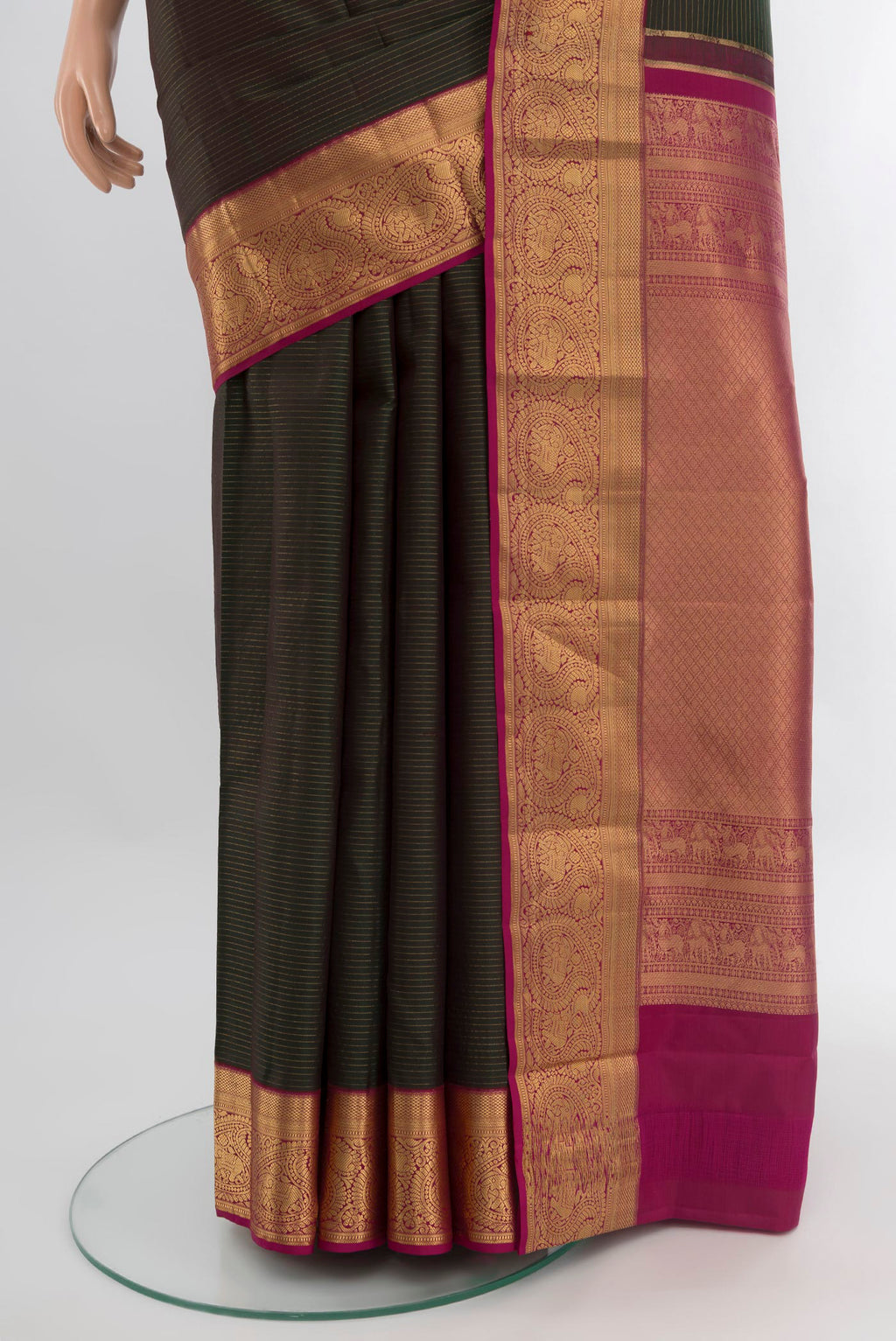 Pleats and pallu of Bottle Green  with Pink Color Kanchipuram Silk Saree with Stripes on the body and Zari Border. 